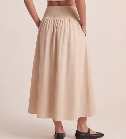 THE NOVA SHIRRED WAIST MAXI SKIRT IN BEIGE