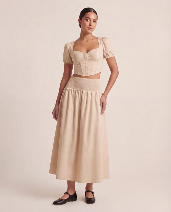 THE NOVA SHIRRED WAIST MAXI SKIRT IN BEIGE