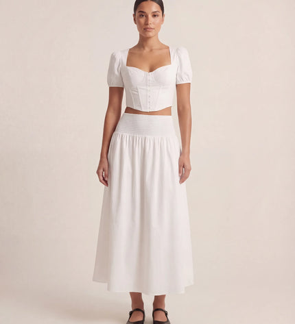 THE NOVA SHIRRED WAIST MAXI SKIRT IN WHITE