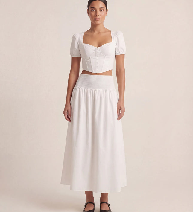 THE NOVA SHIRRED WAIST MAXI SKIRT IN WHITE