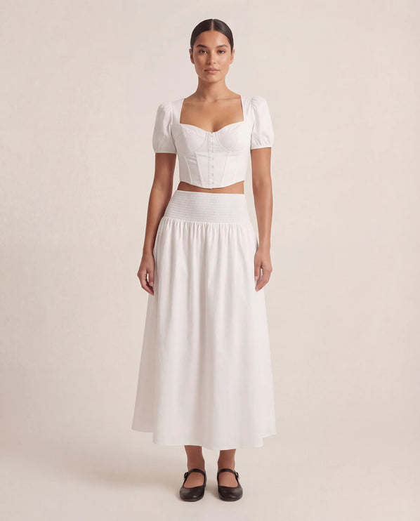 THE NOVA SHIRRED WAIST MAXI SKIRT IN WHITE