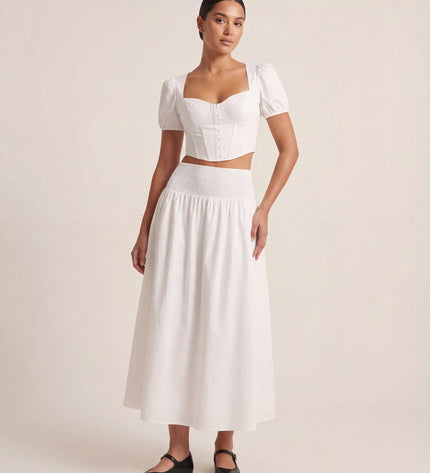 THE NOVA SHIRRED WAIST MAXI SKIRT IN WHITE