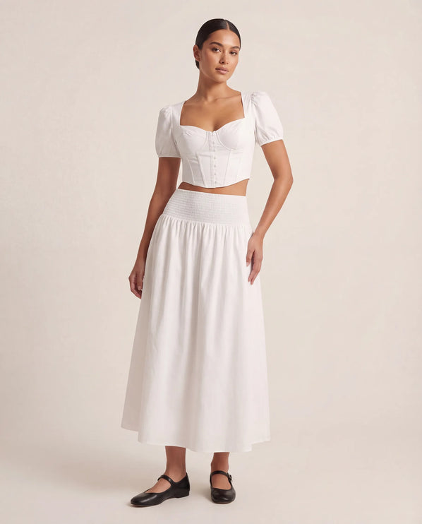 THE NOVA SHIRRED WAIST MAXI SKIRT IN WHITE