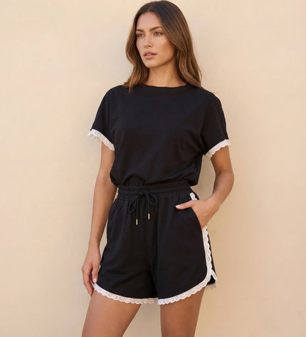 THE AMIE LACE TRIM ROMPER IN BLACK