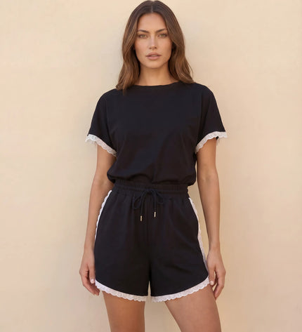 THE AMIE LACE TRIM ROMPER IN BLACK