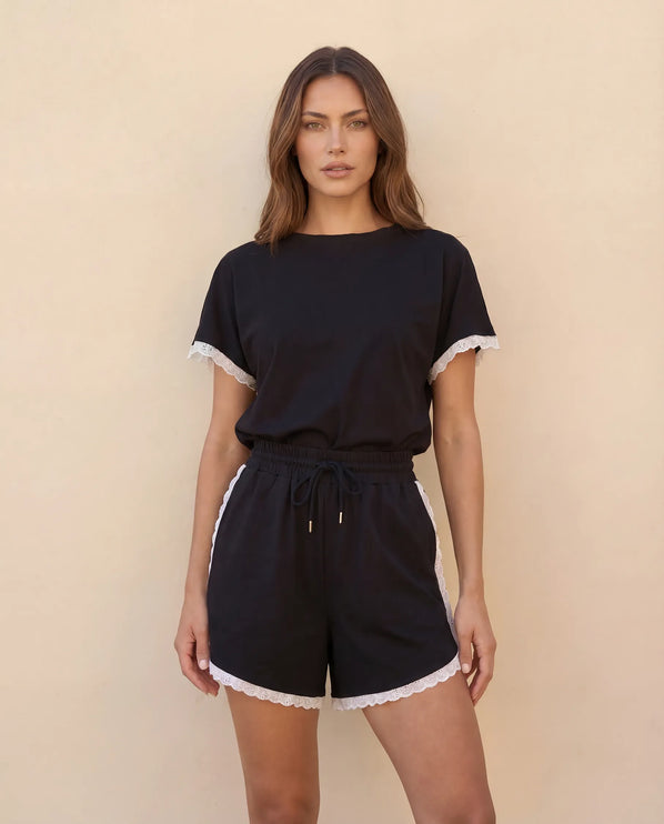 THE AMIE LACE TRIM ROMPER IN BLACK