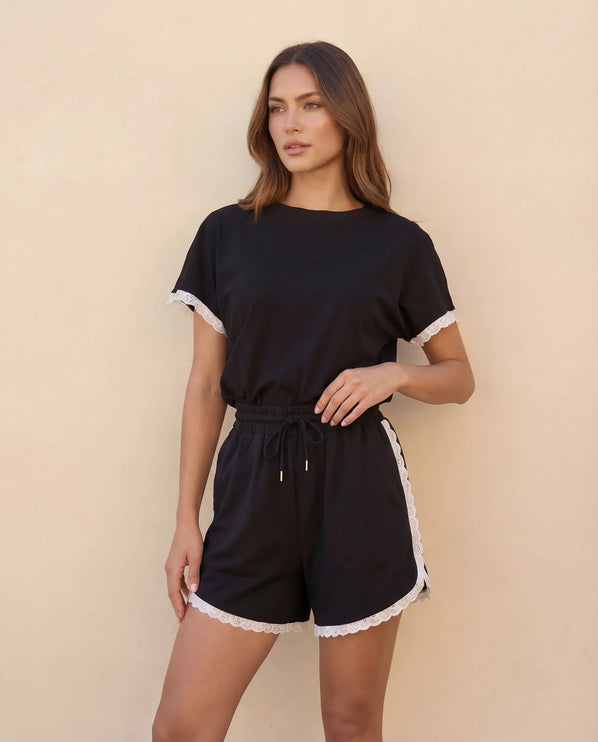 THE AMIE LACE TRIM ROMPER IN BLACK