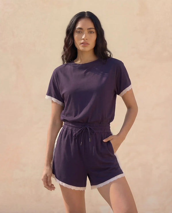 THE AMIE LACE TRIM ROMPER IN NAVY