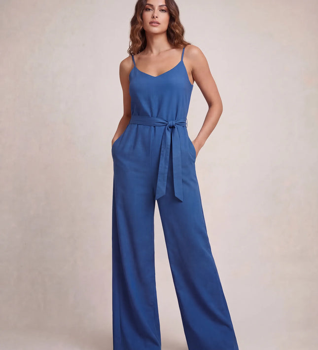 THE NALA TIE BELT WIDE LEG JUMPSUIT IN BLUE