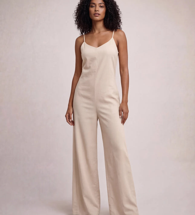 THE NALA TIE BELT WIDE LEG JUMPSUIT IN BEIGE