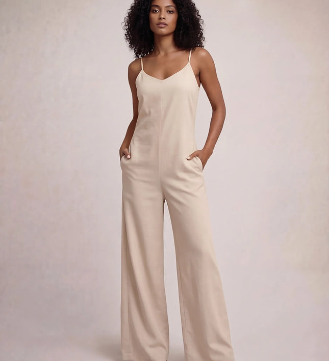THE NALA TIE BELT WIDE LEG JUMPSUIT IN BEIGE