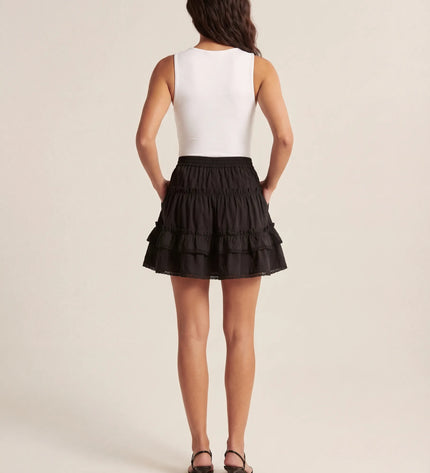 THE LYRA BRODERIE & FRILL PANEL MINI SKIRT IN BLACK