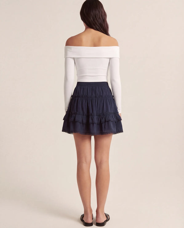 THE LYRA BRODERIE & FRILL PANEL MINI SKIRT IN NAVY