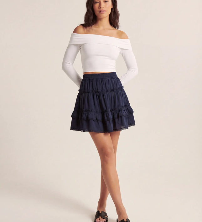 THE LYRA BRODERIE & FRILL PANEL MINI SKIRT IN NAVY