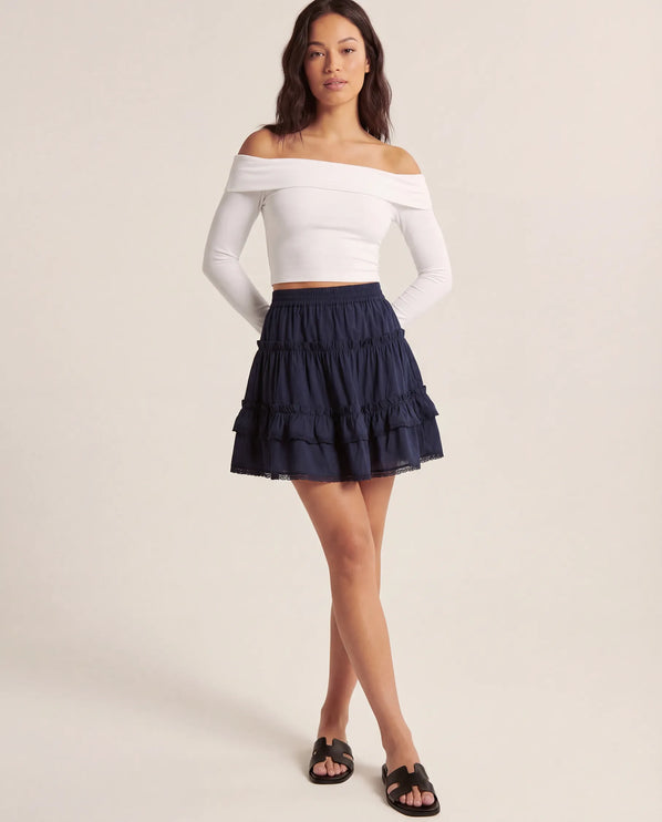 THE LYRA BRODERIE & FRILL PANEL MINI SKIRT IN NAVY