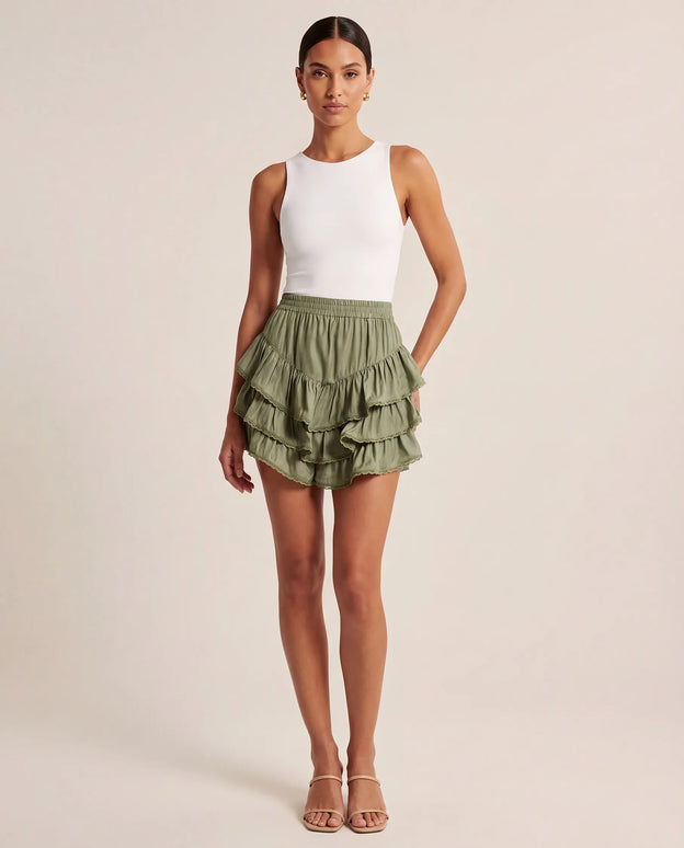 THE NIA THREE-TIERED RUFFLE SKORT - SAGE GREEN