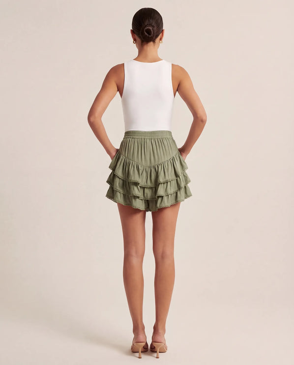 THE NIA THREE-TIERED RUFFLE SKORT - SAGE GREEN