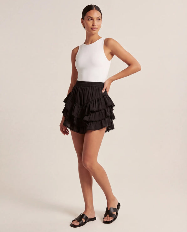 THE NIA THREE-TIERED RUFFLE SKORT - BLACK
