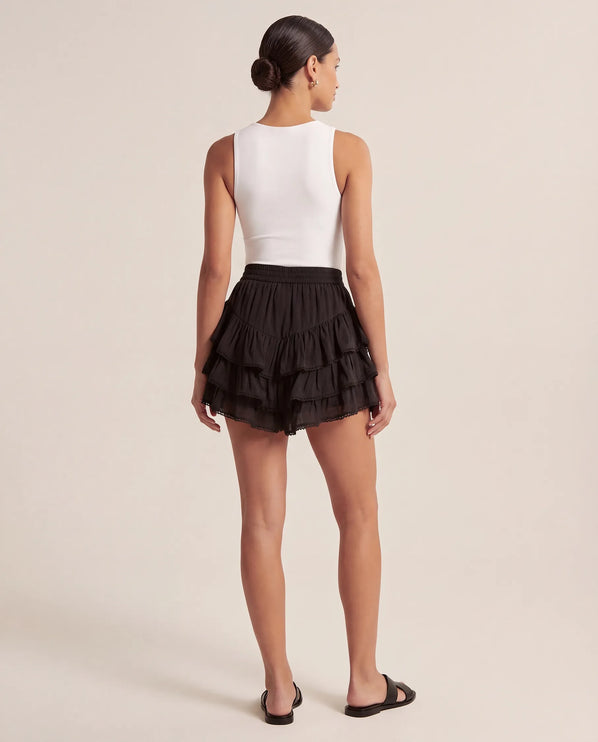 THE NIA THREE-TIERED RUFFLE SKORT - BLACK