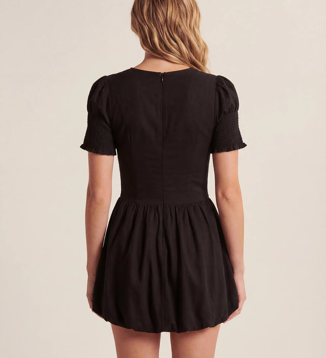 THE MIRA SMOCKED BUBBLE MINI DRESS IN BLACK