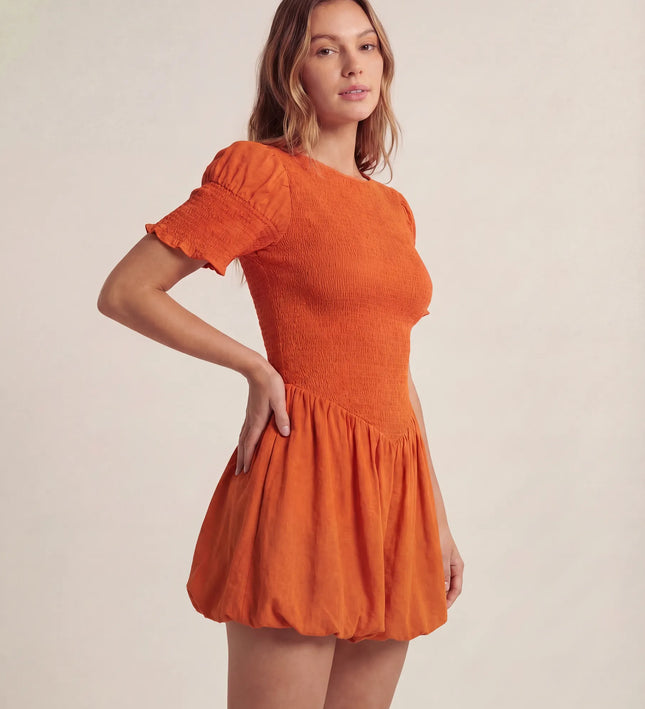 THE MIRA SMOCKED BUBBLE MINI DRESS IN ORANGE