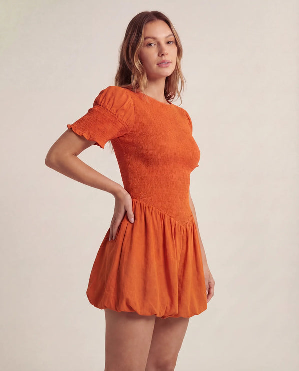 THE MIRA SMOCKED BUBBLE MINI DRESS IN ORANGE