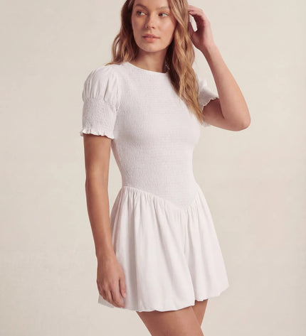 THE MIRA SMOCKED BUBBLE MINI DRESS IN WHITE