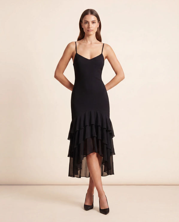 THE SCARLETT RUFFLE HEM MIDI DRESS IN BLACK
