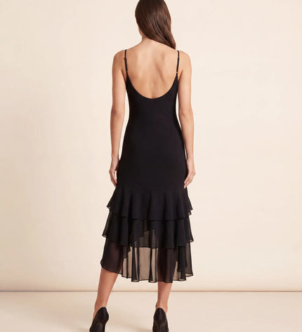 THE SCARLETT RUFFLE HEM MIDI DRESS IN BLACK