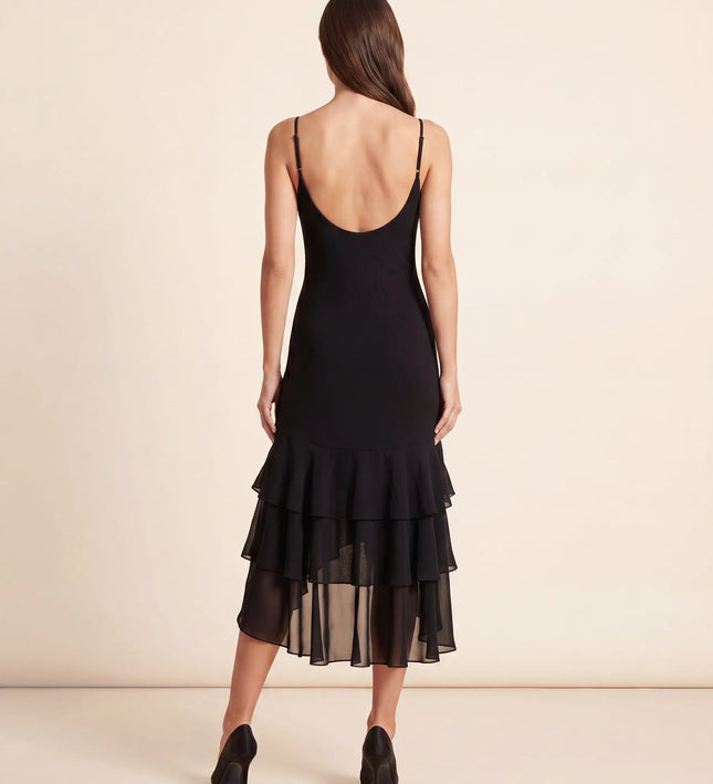 THE SCARLETT RUFFLE HEM MIDI DRESS IN BLACK