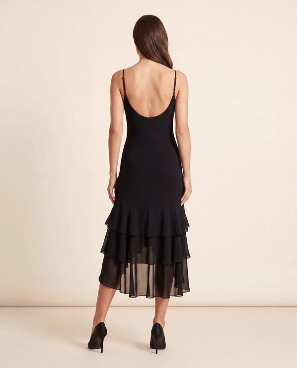THE SCARLETT RUFFLE HEM MIDI DRESS IN BLACK