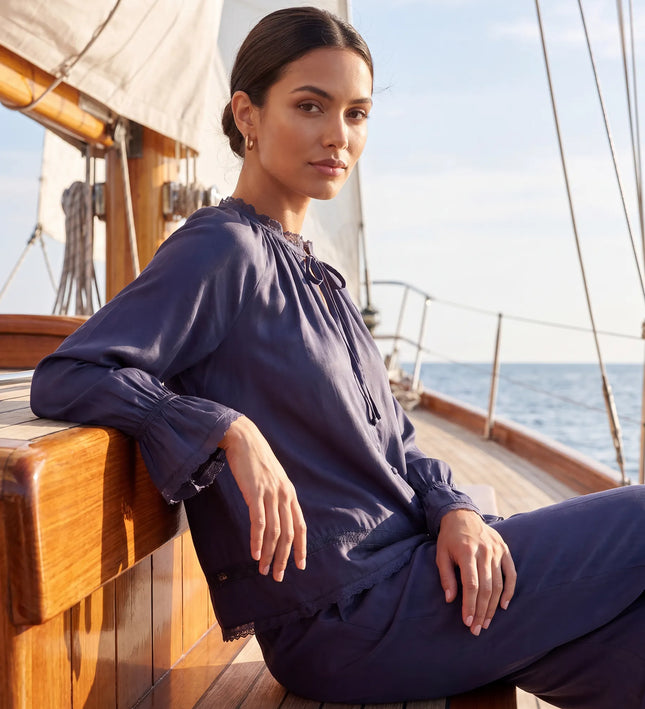 THE CELESTE LACE TRIM BLOUSE IN NAVY