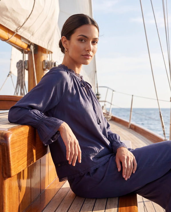 THE CELESTE LACE TRIM BLOUSE IN NAVY
