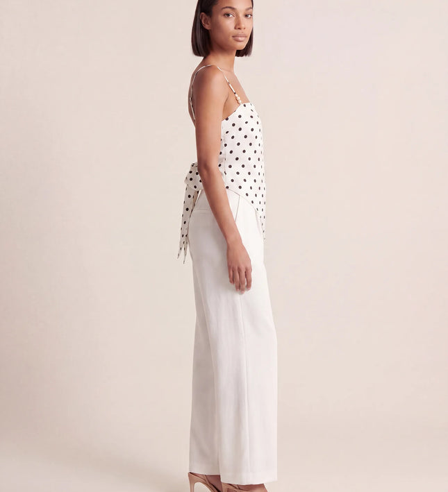 THE SAVANNAH TIE-BACK CAMI TOP IN WHITE POLKA DOT