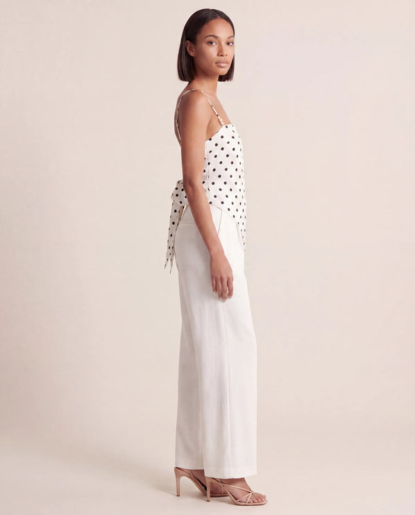 THE SAVANNAH TIE-BACK CAMI TOP IN WHITE POLKA DOT