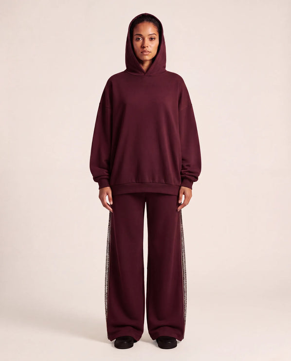 THE AURORA EMBELLISHED MESH PANEL HOODIE IN BURGUNDY